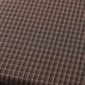 Una cubierta de cojín gris